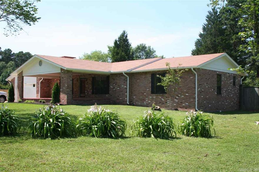 GREAT SPACE BUY AT $67.62 PER SQUARE FOOT! This house has 4 large bedrooms, 3 full baths, dining room, basement, and a in-ground pool all on an 1 acre lot in the middle of Bryant!  There is new carpet, tile, new appliances, & fresh paint throughout! All of the bedrooms are very large.  2 of the 4 bedrooms have private bathrooms.  The kitchen is large with an island.  It overlooks the backyard & pool.  Outside is a large patio perfect for entertaining!  The pool will be completed with an acceptable offer.