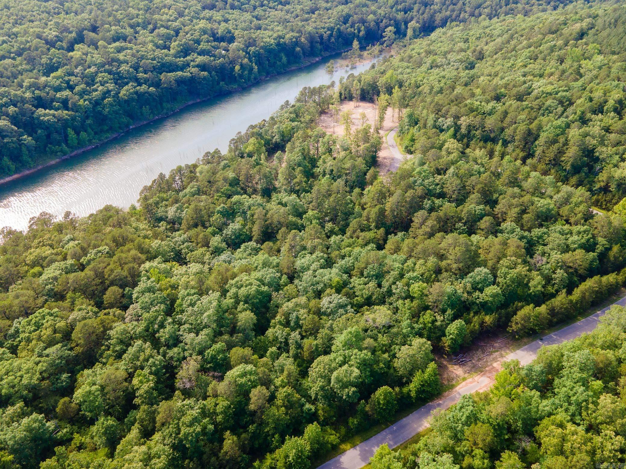 Beautiful lake front lot in Buckhead Subdivision. Walk to the water and enjoy the views. Great white lines. Water and electric onsite. Build an amazing lake house TODAY!