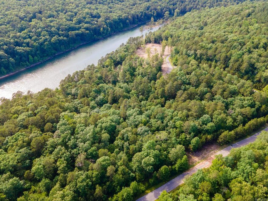 Beautiful lake front lot in Buckhead Subdivision. Walk to the water and enjoy the views. Great white lines. Water and electric onsite. Build an amazing lake house TODAY!