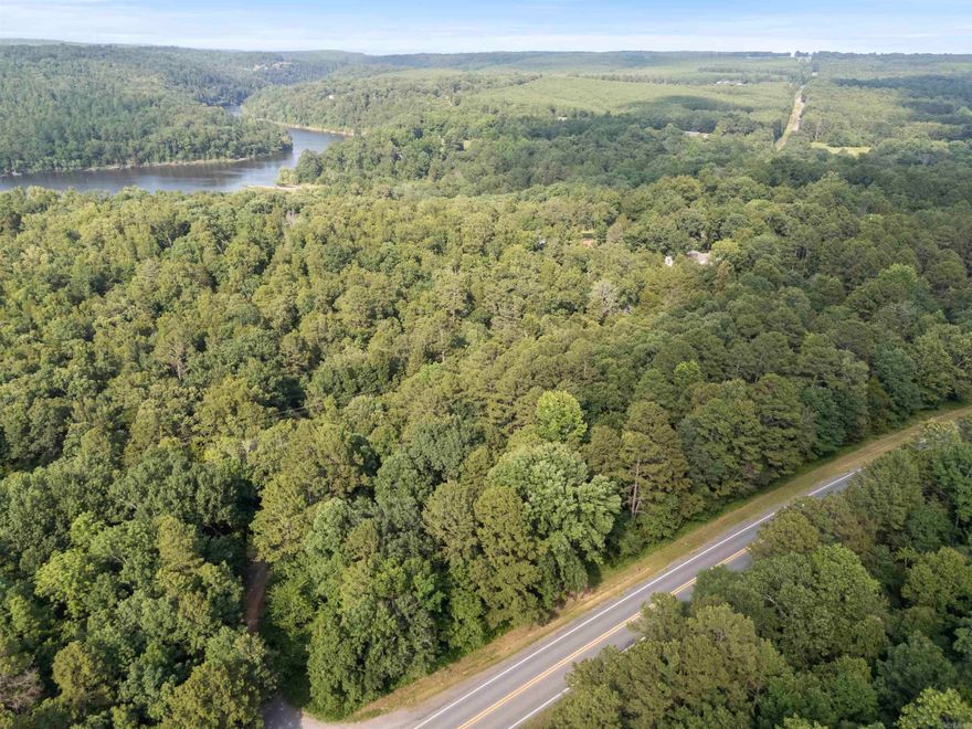 Explore this beautiful one-acre wooded lot in Romance, AR, near Lake Barnett. Perfect for those seeking a rural retreat, the land is sloped and unimproved, ideal for building a dream home or a mobile home. Utilities are available nearby but not yet on the property, and a perc test is required for septic. With immediate possession available at closing, this property offers an excellent opportunity to create your own private oasis in a serene and natural setting.  OWNER FINANCING ACCEPTED WITH $2,000 DOWN TODAY!  Don't miss this affordable opportunity to own a piece of picturesque land in Romance!