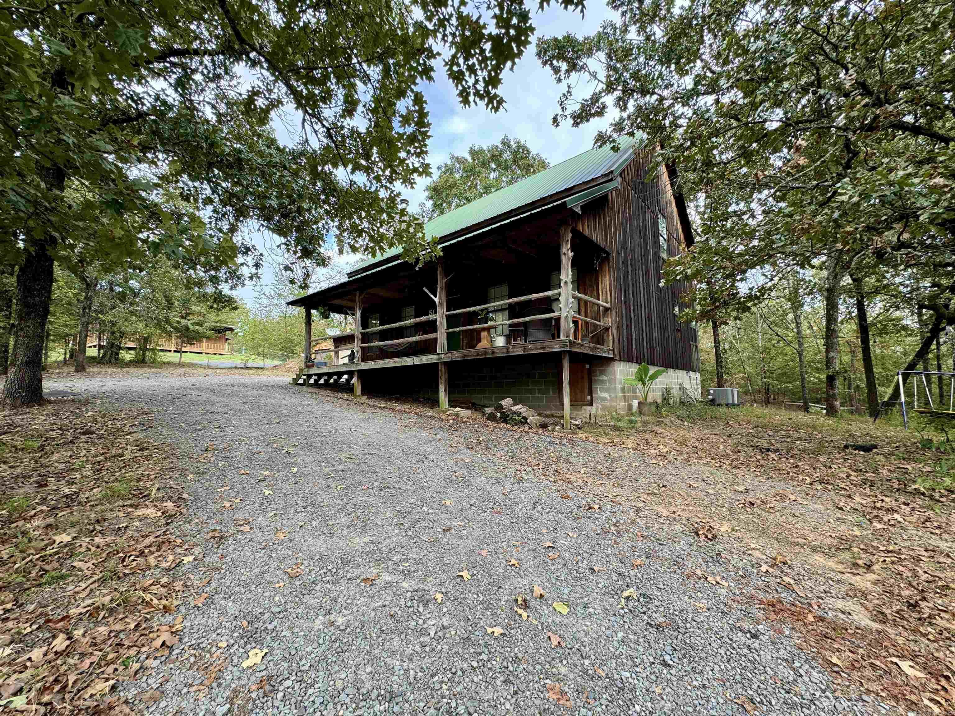 Enjoy the peace of country living just minutes from the city in this log cabināstyle home set on a wooded, one-acre lot just outside of Greenbrier city limits. This spacious home offers plenty of potential for buyers who want to invest in making a space their own. Inside, youāll find flexible living areas and tons of storage. A wood-burning fireplace, a large front porch, and a storm cellar add rustic charm and functionality. Did I mention a wet weather creek right in your back yard? If youāre looking for a home with space, character, and room to make it your own, this one is priced to sell quickly ā donāt miss your chance to see it!