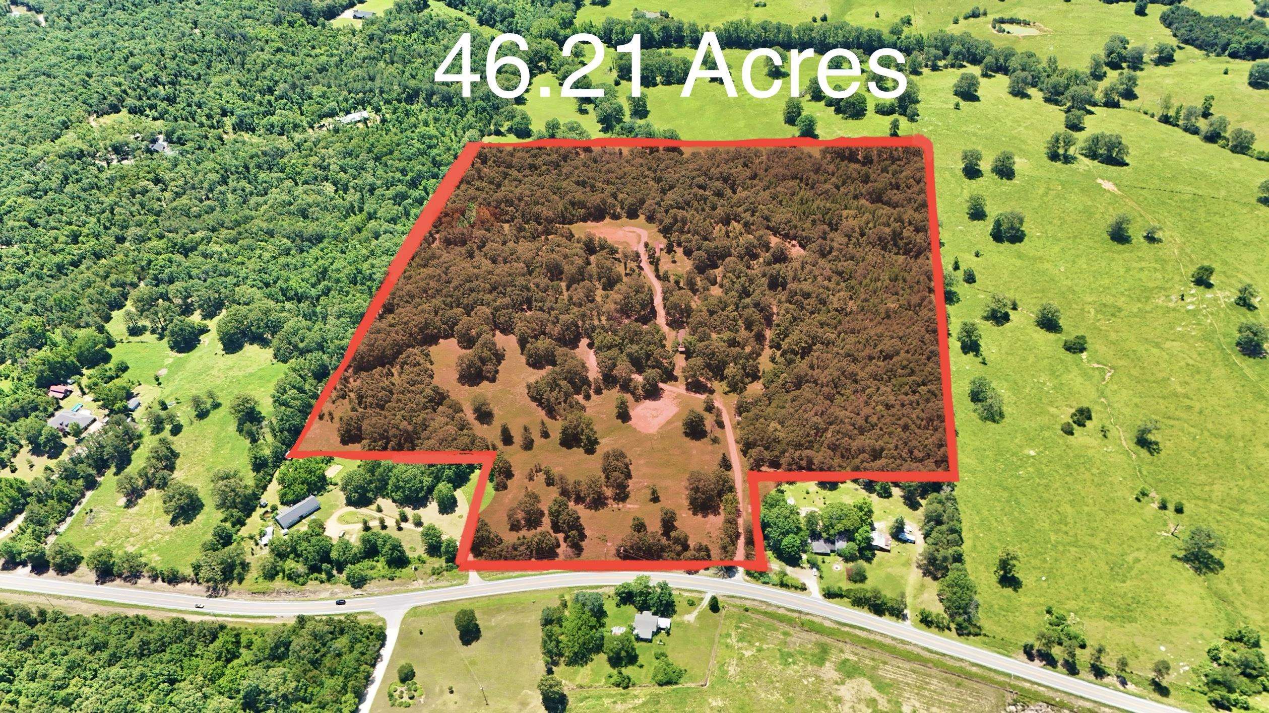46.21 beautiful acres of mixed woods and pasture perfect for hunters, outdoor enthusiasts, or anyone looking to enjoy quiet country living. This versatile property features a peaceful pond, open fields, and wooded areas with established trails ideal for walking, riding ATVs, or exploring nature. As a bonus, the land includes a well-kept 3-bedroom, 2-bath mobile home with a spacious porch and mud room great for a weekend getaway, hunting cabin, or temporary residence while you build. Whether you're dreaming of a private retreat, recreational property, or future homesite, this land offers the freedom, space, and potential to make it your own.