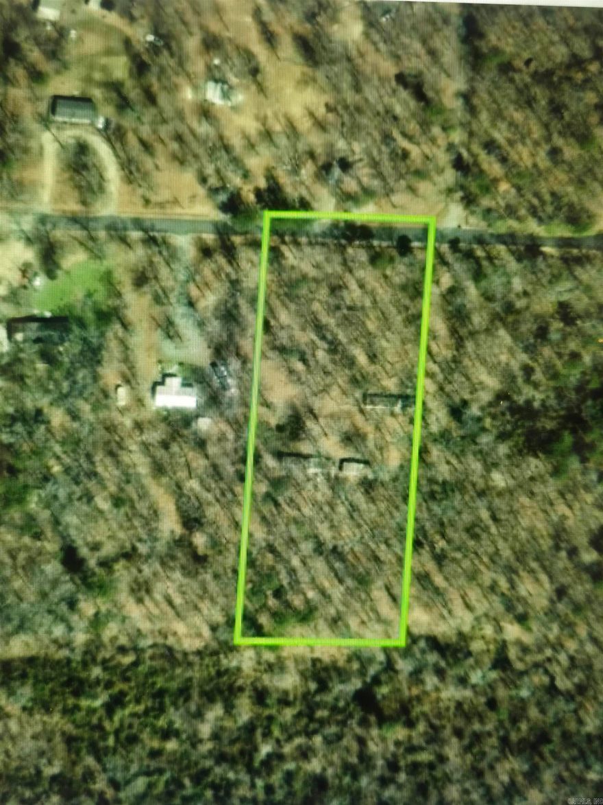 3.4 acres of rural property, unrestricted with utilities. 2 mobile homes on property will convey but need significant repair and no access to the inside is available at this time. Approximately 30x20 Metal frame could be used for shop, tiny home, etc.  Land is mostly flat and wooded with some clearing already done. 2 septics and 2 power poles on property. Creek runs along edge of property line to the right. Go take a look and call with any questions!