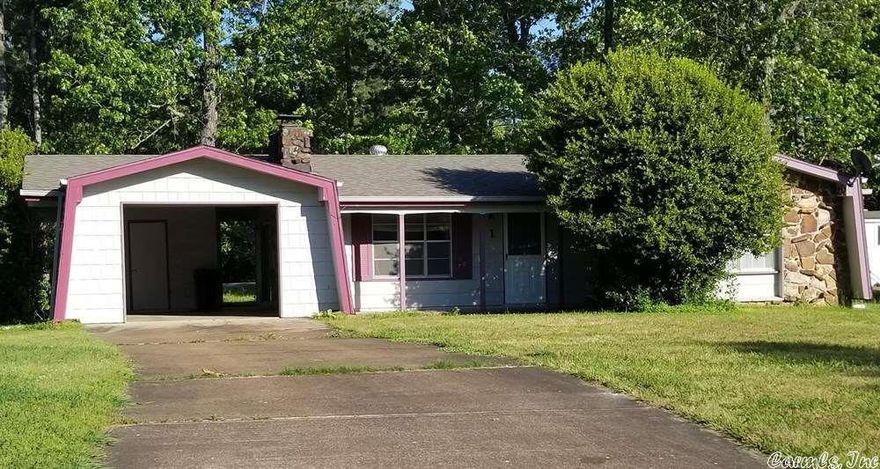 HOME on LEVEL CORNER LOT! 2 bedrooms (1 is big!), 1 bath home. Nice size living room with wood fireplace. Roomy kitchen with elec range, refrigerator, and washer/dryer hookups. Central electric heat/air. 1 car carport with storage. No pets. References and Deposits, (first & last month and security deposit) required. Must have at least a 650 credit score. MLS VIOLATION REMOVED