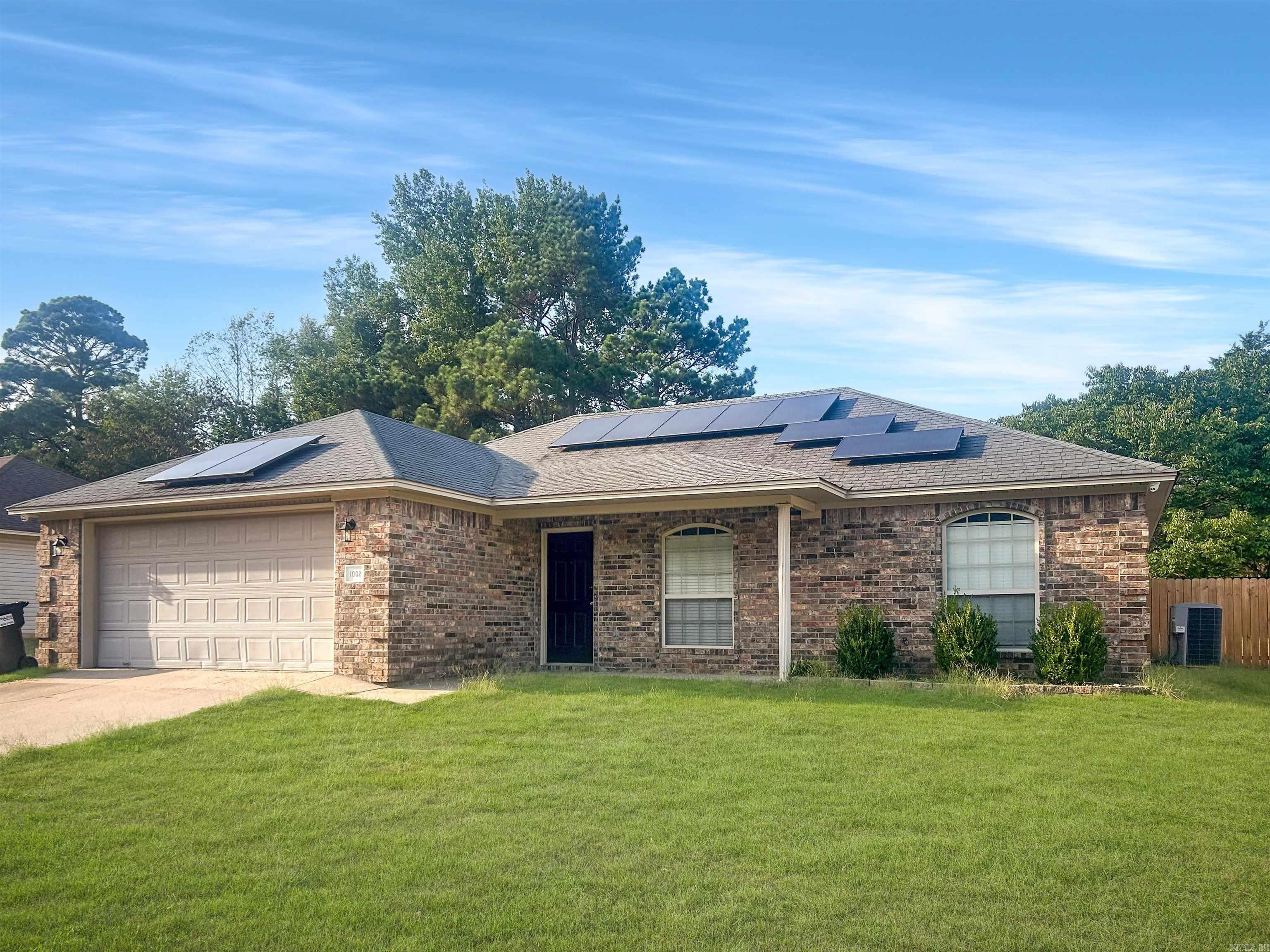 Beautiful 3 Bed, 2 Bath Home with Modern Upgrades & Spacious Layout This move-in ready home features an open floor plan with a desirable split-bedroom layout for added privacy. The master bedroom boasts brand new hardwood flooring, and the home is enhanced with built-in speakers. Enjoy energy savings with solar panels already installed. The large, privacy-fenced backyard offers ample space for entertaining, pets, or gardening. A dedicated laundry room and eligibility for a: $0 down payment RD loan—making this a fantastic opportunity for buyer as well as first time home owners!