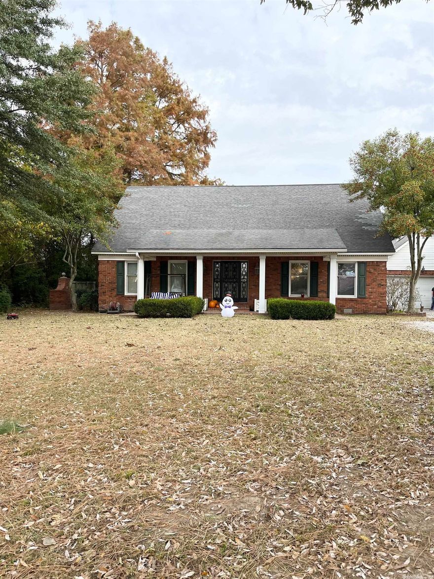 Seller is offering a $20,000 updating allowance and a $600 home warranty.  This gorgeous custom-built beauty has two bedrooms upstairs with a bathroom and two bedrooms downstairs with a bathroom. It has new flooring, new paint, generous closets throughout, and a spacious family room with vaulted ceiling.  This home also includes a workshop that has an office with a separate storage area.