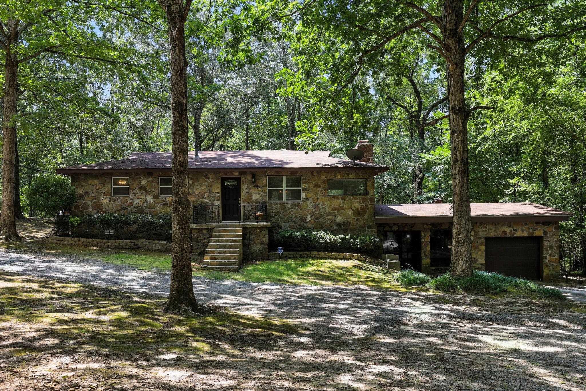 Surrounded by mature trees and greenery, the property feels peaceful and private yet remains minutes from the city. This home boast of Luxury vinyl plank and tile floors in living room, kitchen and bathroom. Great for entertainment with 3 living areas and an amazing deck! This home is priced to sell and move in ready! Don't miss out on your opportunity to own this home!