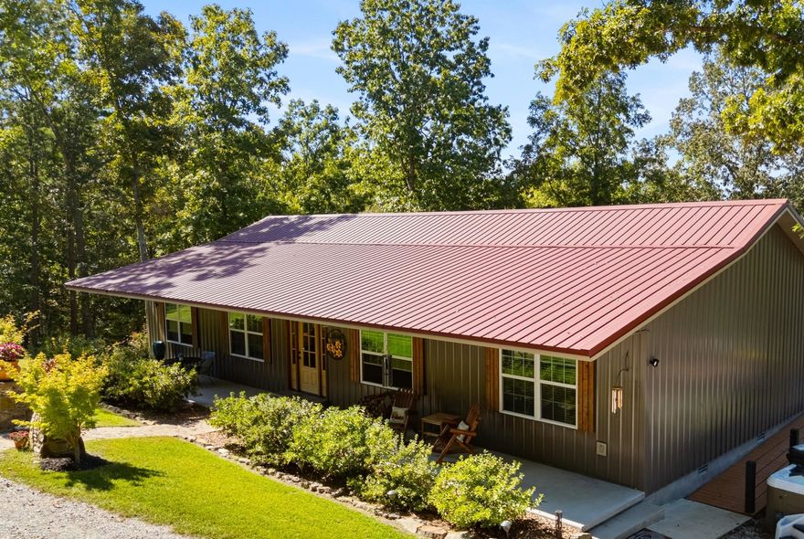 Welcome to this beautifully maintained 3 bed, 2 bath ranch-style home with office in the sought-after Matthews Mountain Estates — where mountain views, generous acreage, and peaceful surroundings meet convenience just minutes from Mountain View. Built in 2020 and thoughtfully updated, this 2,000 sq. ft. single-level home offers comfort, space, and thoughtful design in a setting that feels private without feeling remote.  Situated on 7.15 acres along a quiet, dead-end road within one of the area’s more established mountain communities, the property provides room to expand and breathe while still enjoying the reassurance of neighboring homes nearby. Here, you’ll experience wide-open skies and mountain scenery paired with the confidence of a well-maintained, respected community setting.  The private primary suite features a spacious walk-in shower and generous closet space, thoughtfully separated from guest bedrooms. Outdoor living shines with an expansive raised-bed garden, and spacious side deck. With a 24x36 garage, 2-car carport, RV pad, metal roof, and whole-house generator, this mountain retreat blends exclusivity, security, and everyday livability.