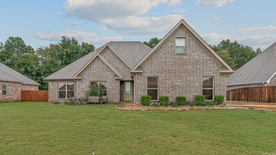 Welcome to Market 111 Gulley Drive, Brookland, AR!! Step inside this beautiful five bedroom, two bath home located in the desirable Brookland School District! Built in 2020, this spacious home offers a modern open-concept layout, perfect for growing families or those needing extra room for a home office, guest space, or hobbies. As you walk inside you will find a bright and inviting living area with durable flooring, neutral finishes, and plenty of natural light. The kitchen features stylish cabinetry, ample counter space, and a convenient breakfast bar overlooking the dining and living spaces ideal for entertaining or everyday living. You will love the gorgeous fireplace to keep you warm in the winter. The primary suite boasts two walk-in closets and private en-suite bath with a soaking tub, while four additional bedrooms provide flexible space for any lifestyle. Outside, enjoy a fully fenced backyard backing up to trees-great for pets, kids, or relaxing evenings on the patio. Updates Sellers have done include adding gutters. Call today to schedule your private showing of this gorgeous home!!