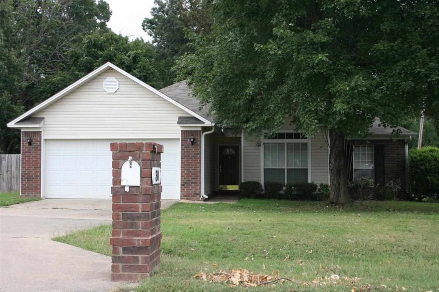 Updated 3br,2ba, home in established neighborhood  convenient to  schools and shopping. Home has been freshly painted , new carpet in bedrooms, new pet/ kid friendly laminate flooring installed in foyer, hall, and greatroom! Large master suite w dbl vanities and closets, sep shower, jetted tub. Split plan w fireplace, privacy fenced back yard, extra large patio,guttering, attic is mostly floored, green space at rear of yard. Agents see remarks.