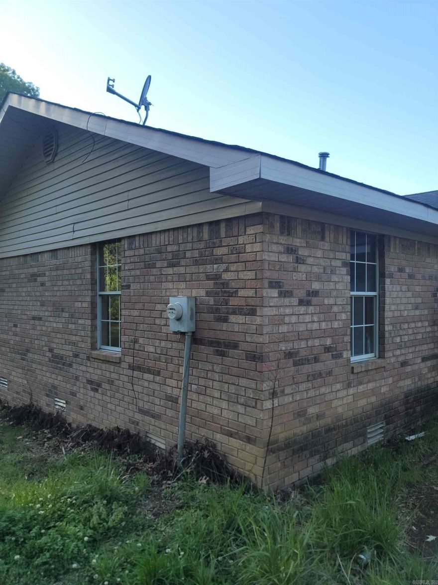 COUNTRY LIVING ON THE RIDGE, WELCOME THIS NICE WESTERN STYLE BRICK HOME SITTING ON 1.5 +/- AC IN ST FRANCIS COUNTY, AR. THIS SPACIOUS HOME FEATURES 3 BEDROOMS 2 BATH WITH LARGE WALK IN CLOSETS, OFFICE AND A 2 CAR GARAGE, THIS HOME WAS CURRENTLY GOING TO BE REMODELED AND THE OWNER DECIDED TO MOVE TO A DIFFERENT LOCATION AND HAS DECIDED TO SELL AS IS. THIS IS A GREAT CHANCE TO FINISH THIS HOME WITH YOUR OWN STYLE AND TASTE TO LIVE IN OR USE FOR A GREAT RENTAL PROPERTY. THE HOME SITS ON A PRIVATE ROAD AND ONLY 12 MILES FROM WYNNE, AR AND 7 MILES FROM VILLIAGE CREEK STATE PARK.AND 11 MILES FROM LAKE DUNN. WITH GREAT HUNTING AND FISHING NEAR BY. THIS IS A VERY UNIQUE HOME WITH LOTS OF POTENTIAL.