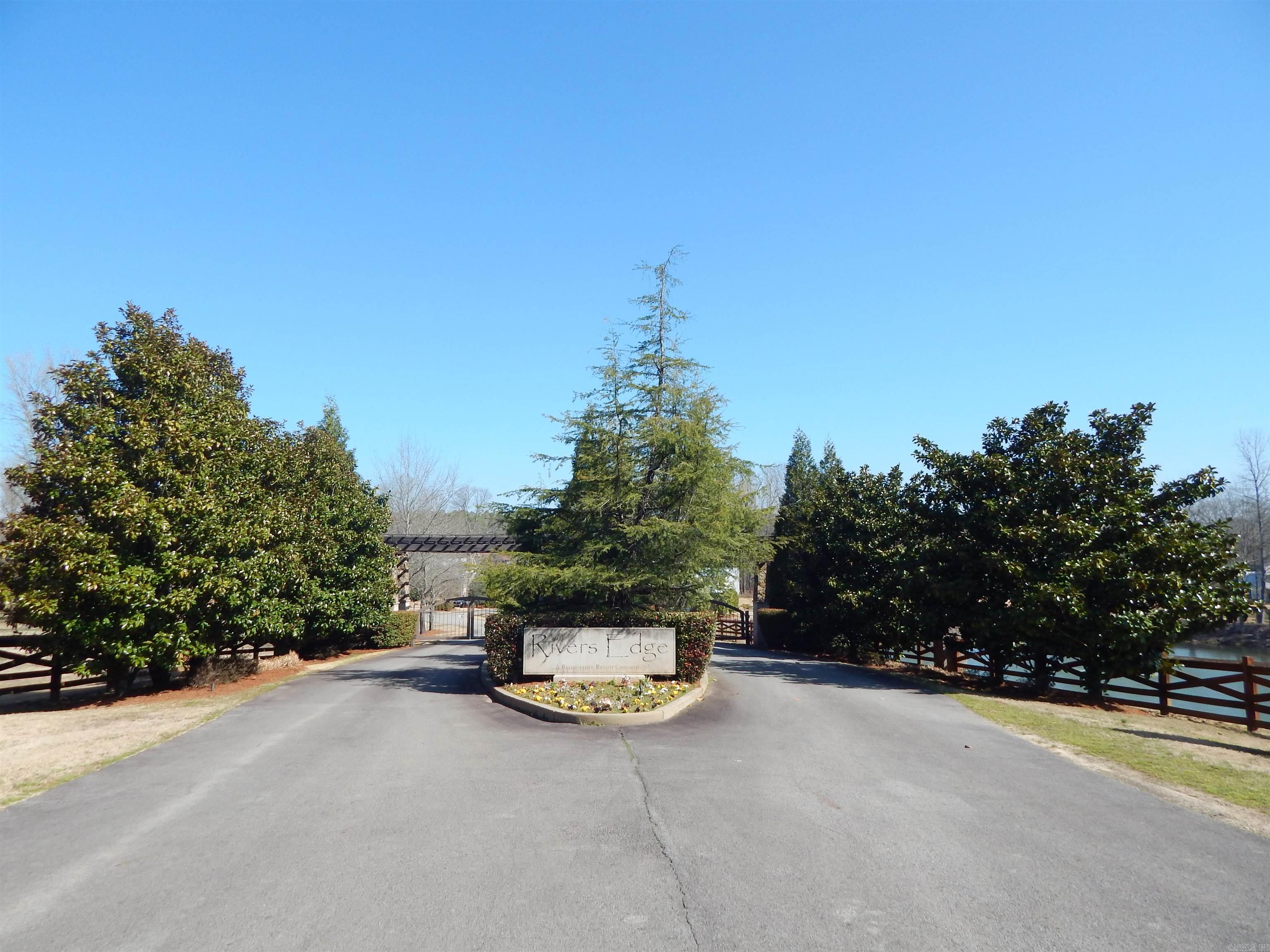 Rivers Edge is a Zero Maintenance Subdivision on the Little Red River! Beautiful Lot located just across the street from the river & subdivision access, and a few steps from the community pool. Gated entry, private sewer system, city water, Community Dock & Mountain Views are just a few of the amenities that this subdivision offers. All ground maintenance, private roads & pool access is included at projected