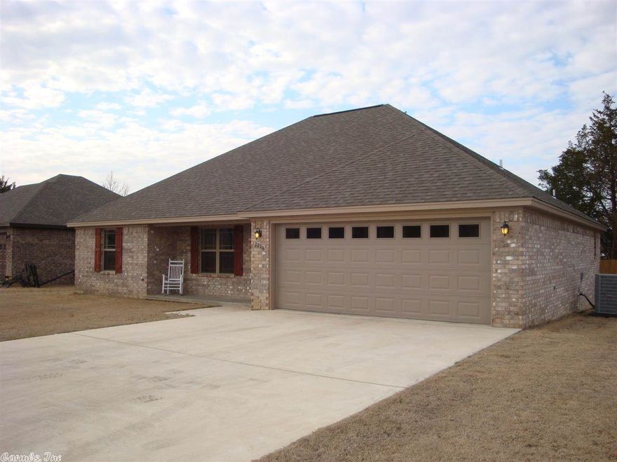 Among the more spacious houses in Ridgewood, this all-brick new home has an extra room off the kitchen that can be used as a bedroom, crafts room or office. Private backyard with 6-foot fence. Laminate and tile in the living areas; carpeting in the bedrooms. Open floorplan has eat-in kitchen that opens to covered patio. Stainless appliances, extra insulation and energy-efficient features including 3.5-ton HVAC.