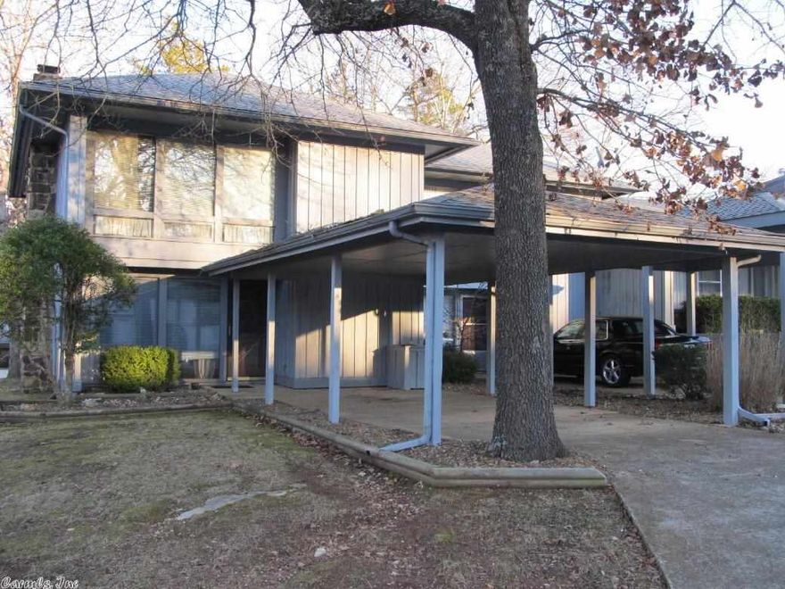 Great Price on Townhouse - This townhouse offers two bedrooms, 1-1/2 baths, living room, kitchen, utility room, carport, fireplace and back patio, all on 2 levels within walking distance of the Town Center. What a Great Price, $41,500!!