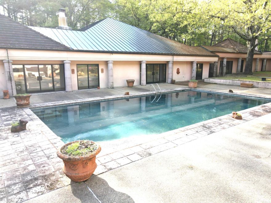 Estate Fit for Presidents- Over 11,000 sq ft on 30 Serene Acres! This 11,047 sq ft masterpiece on 30 acres has hosted three US Presidents. Built in 1986, it features 4 Bedrooms, 5 full baths and 2 1/2 baths, 3 Kitchens, multiple fireplaces, inground swimming pool, guest house, and so much more! Ideal for a luxury retreat, event venue, or multi-family haven.