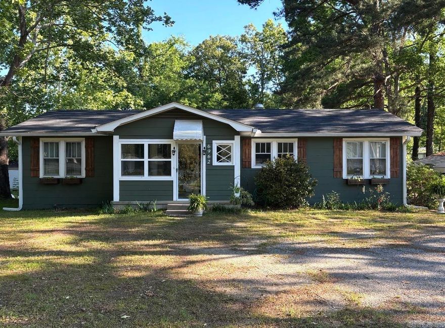 Experience peaceful country living! This home sits on two acres and falls within the desirable Sheridan School District. With low utilities and thoughtful updates throughout, this home offers comfort and efficiency year-round.  Features include a 38x24 shed, newer roof, quartz countertops in the kitchen, laundry, and bath, and natural gas powering the range, gas logs, and central heat. Enjoy the enclosed front porch (improved in 2021), perfect for relaxing in any season.  Other updates include:  Rewrapped ductwork (2024) Exterior paint (2018) Interior paint (2017) New plumbing and light fixtures (2017) New LVP flooring throughout Current survey and termite clearance You won’t find another home that combines a country feel, modern updates, and move-in-ready condition quite like this one!