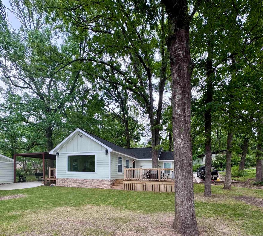 Newly built Lakefront Home w/Private dock. Enjoy lakefront living in the brand-new 1,067 sq ft home situated on a quite small lake. Featuring stunning water views, this home offers an open concept layout with abundant natural light, modern finishes, and seamless indoor-outdoor flow. The kitchen boasts granite countertops, stainless steel appliances, and custom cabinetry. The primary bedroom overlooks the lake, while private dock provides easy access for fishing, kayaking, or relaxing by the water. Perfect for a full-time residence or weekend getaway.