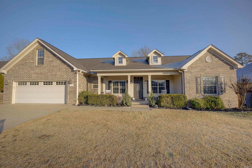 Beautifully well maintained home with 3 bedrooms, upstairs bonus room that can be a 4th bedroom, 3.5 baths, plus amazing flagstone patio, built in grill & fire pit off the covered back porch, an entertainer's paradise. Open living area anchored by wood burning fireplace, hardwoods, tile in wet areas, & large master suite. Home also offers security & central vac systems & tons of storage off the bonus room. Superb Home! You will want to see this one!