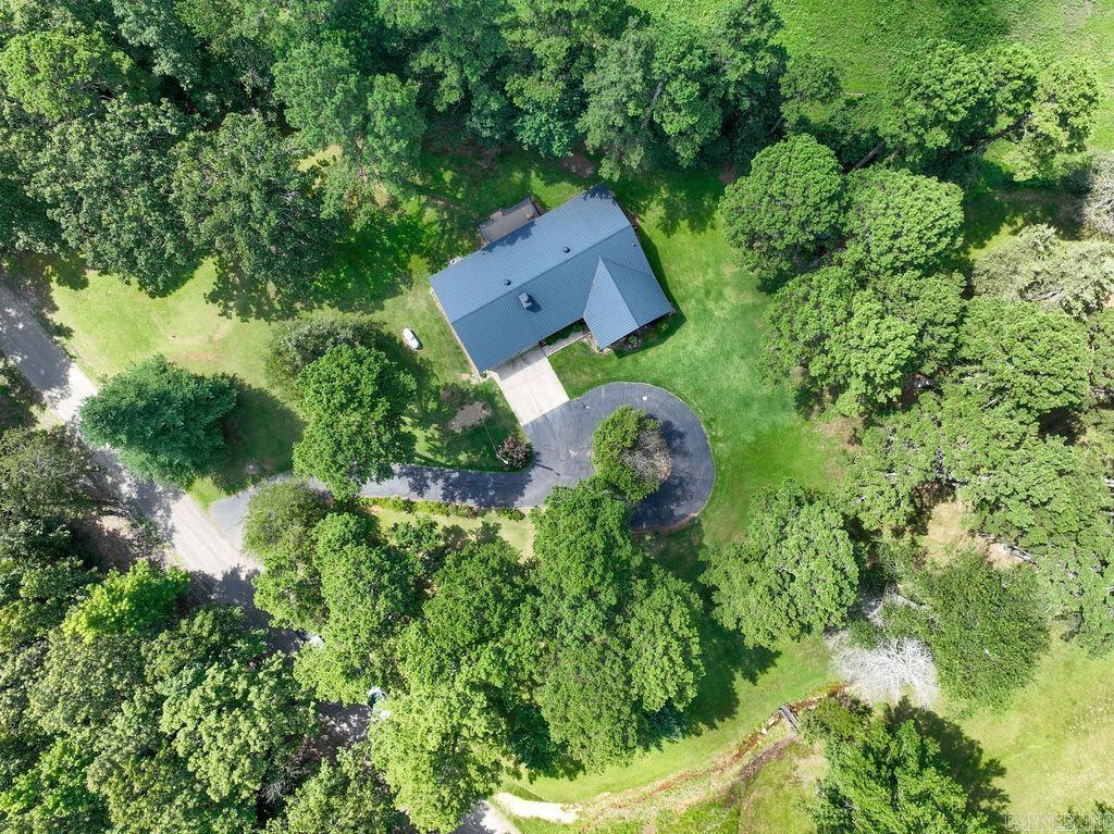 Completely remodeled and updated!!! All new EVERYTHING... including bathrooms, (one with walk in shower), washer/dryer and all kitchen appliances! This 2 bedroom home is perfectly situated to offer you space and solitude while also being just minutes from Heber Springs and the lake and river.
