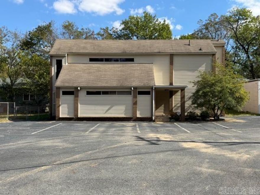 This two-story building is conveniently located just half a mile from North Little Rock High School, providing quick access to interstate and downtown. The building offers ample space for office accommodations. Its appealing layout features five booths for individual workspace, with beauticians’ offices upstairs equipped with a small kitchen, shower, and living space.
