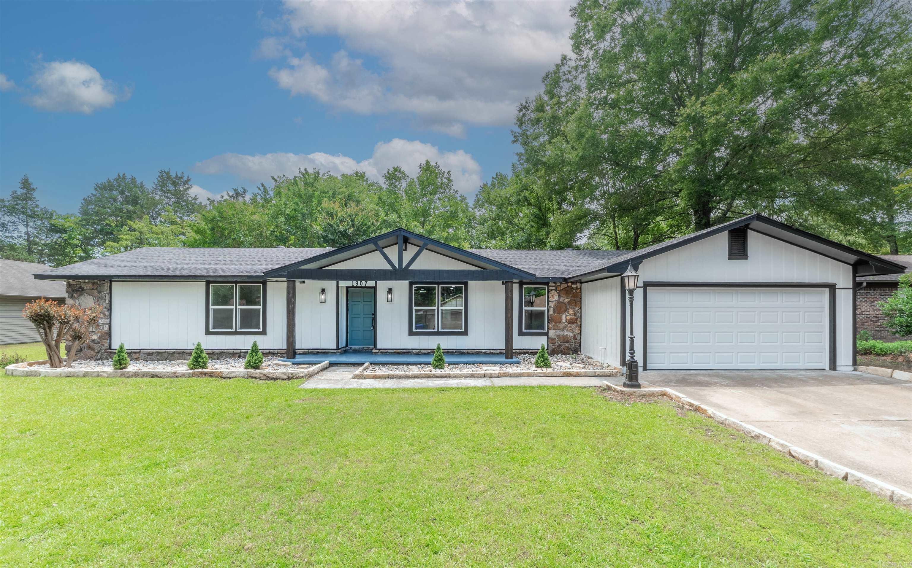 This beautifully updated 4-bedroom, 3-bathroom home offers the perfect blend of style, comfort, and flexibility—and it's priced below recent appraised value. Inside, you'll find brand-new flooring, updated countertops, a cozy electric fireplace, and fresh finishes throughout. The layout includes a formal living room/den, an additional flex space ideal for an office or playroom, a spacious primary suite with an en-suite bath, and a second bedroom with its own private bathroom—perfect for guests or multi-generational living. Major upgrades include a new roof and new HVAC system. Outside, you'll find a storage shed that conveys with the property, and the refrigerator is also included—making this home truly move-in ready. Agents see remarks.
