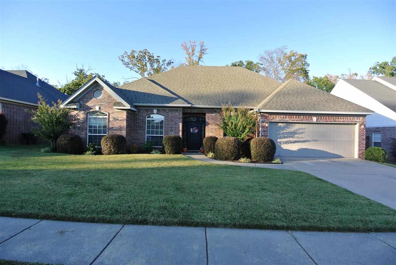 Immaculate home! Excellent location with large private back yard! Foyer has hardwoods, office on one side with glass doors, elegant dining room on the other. Large great room has fireplace. Kitchen has tile floors, plenty of cabinet space, pantry, breakfast bar & eat in kitchen. Spacious master suite, huge master bath, his/her sinks & walk in closets! Separate whirlpool tub & shower. Other bedrooms set apart, bathroom imbetween. Covered back patio, back yard is fully fenced! Alarm system, Bryant Schools!