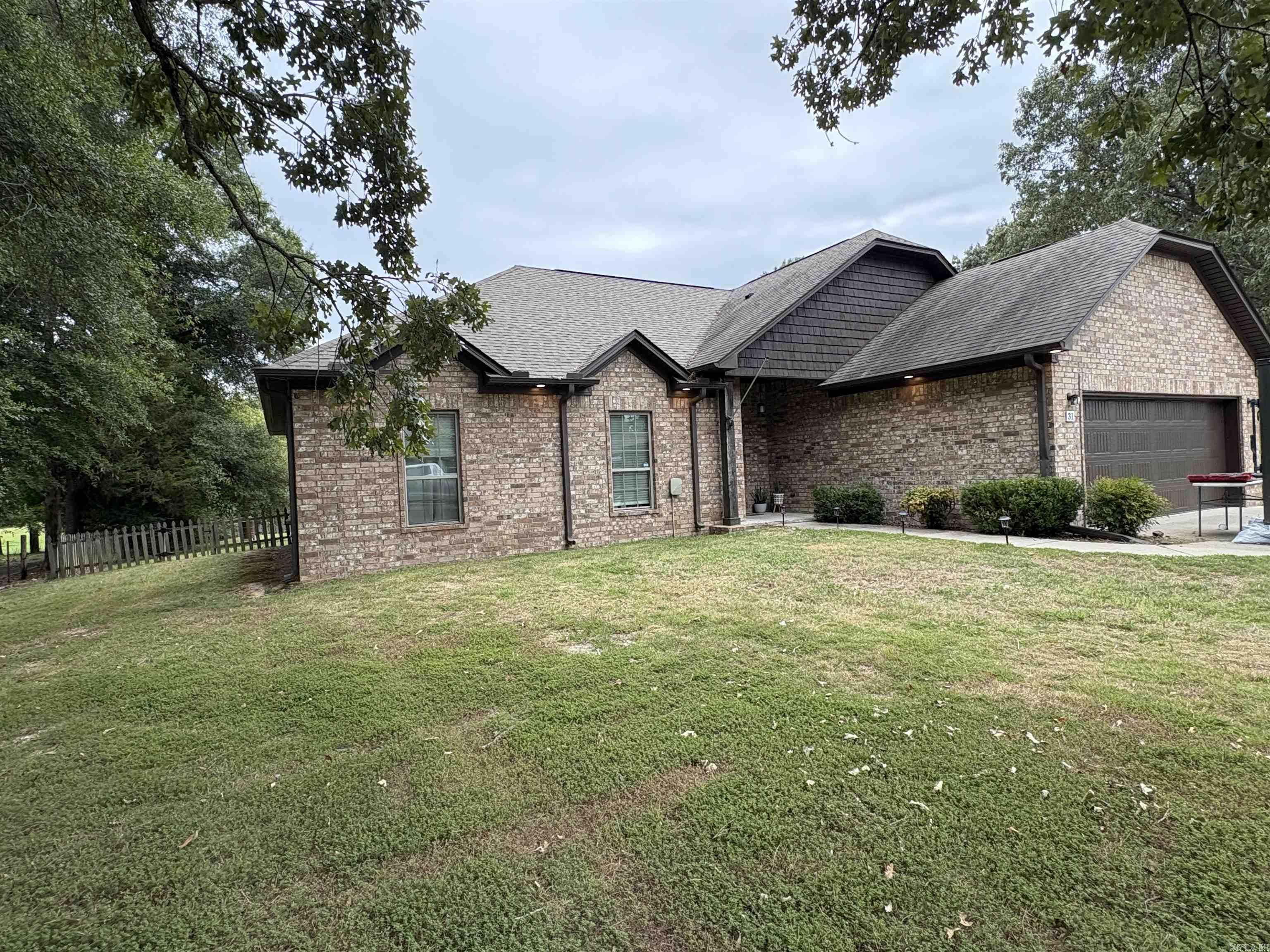 Nice open floor plan with corner fireplace in the great room. Custom Cabinets with granite throughout. Breakfast bar & walk in pantry in the kitchen. Master has a walk in shower and whirlpool tub. Hardwood in formal areas. Tile in wet areas and carpet in the bedrooms. Large laundry room. New dishwasher and garage door 8-25-25. Nice covered back patio with an extended oversize deck. Fully fenced backyard all sitting on a 1/2 acre lot. Extended driveway for extra parking in the front.Ā Less than 10 minutes to Conway. Agents see remarks & docs.
