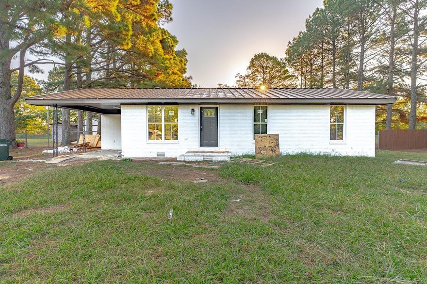 Under Renovation**  Welcome to Market 324 Robin St in Bono, AR!  This beautiful home is a must see! Brand new: Sub Flooring; Floors; Plumbing; Electrical; Cabinets; Granite Countertops; Walls; A/C; Bathroom Toilet; Sink; Cabinet; Water Heater; Walnut stained Wooden Beamed Trim  separating the living room from the kitchen; Doors!  Brand new Wooden outside beams under the carport!  Inside decorated with black & white granite countertops & white cabinets.  Will be finished soon!  Come & see!