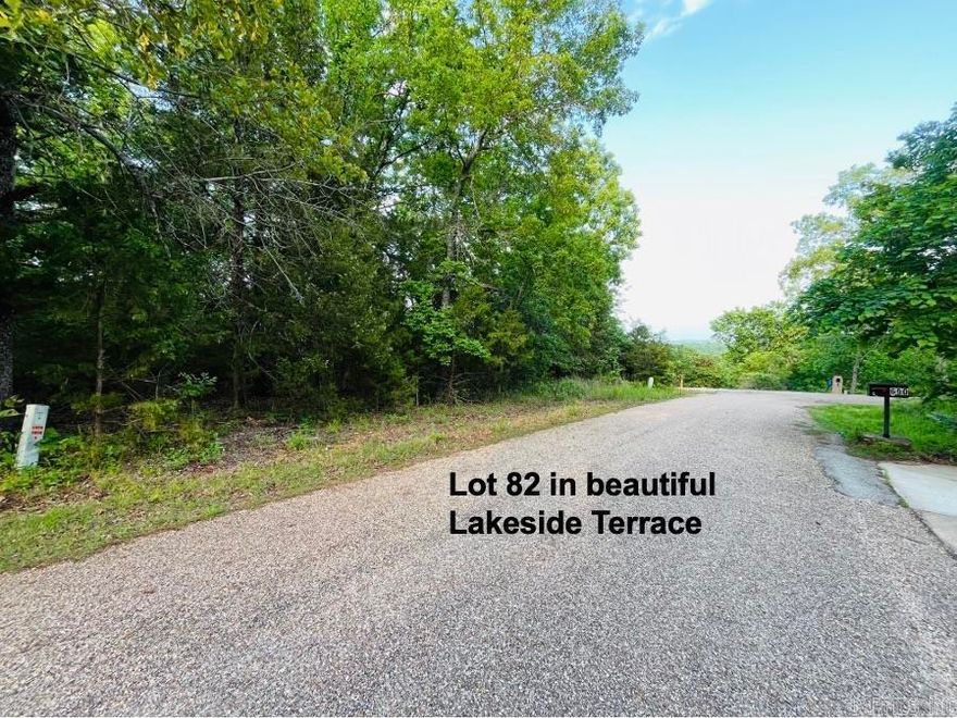 Excellent lot in the quiet Lakeside Terrace Subdivision off of Mallard Point.  Just 3.1 miles to Cranfield Boat Dock on beautiful Norfork Lake.  Surrounded by very nice homes, Lot 82 is level with plenty of hardwood trees to shade your new home.  Association water, paved streets, electric at the road and reasonable restrictions make your new building lot ready to start your custom home.  Super close to restaurants, shopping, and the hospital.  Build your dream home and enjoy walks down to the lake through the scenic neighborhood!