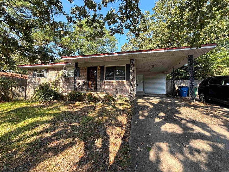 Check out this gorgeous 3 Bedroom, 2 Bath home in NLR on a corner lot. This home features two living spaces with one having a cozy fireplace. Spacious kitchen with plenty of  countertop space and appliances. Carpet in all 3 bedrooms. Nice backyard with plenty of space and a covered back patio with gas grill and storage building. Schedule an appointment today! SOLD AS IS CONDITION. SHORT SALE. AGENTS see remarks! NO SIGN IN THE YARD