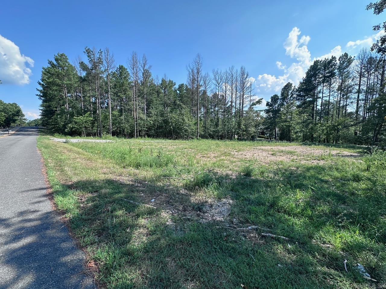 Beautiful .62-acre corner lot in the desirable Isabella Golf Course area on the east side of Hot Springs Village! This cleared, level lot is located in a residential subdivision and is ready for your dream home. Enjoy the convenience of being just a short golf cart ride to Isabella CafĆ©, Granada Golf Course, and Diamante Restaurant. The generous size and prime location offer endless design possibilities with plenty of space for outdoor living. The East Gate provides quick access to shopping in Benton and Little Rock, plus the convenience of an International Airport. Whether youāre looking for a peaceful retreat or a full-time residence, this lot provides the perfect setting in a community known for its golf, lakes, trails, and recreational amenities. Donāt miss this opportunity to build in one of the Villageās most desirable areas!