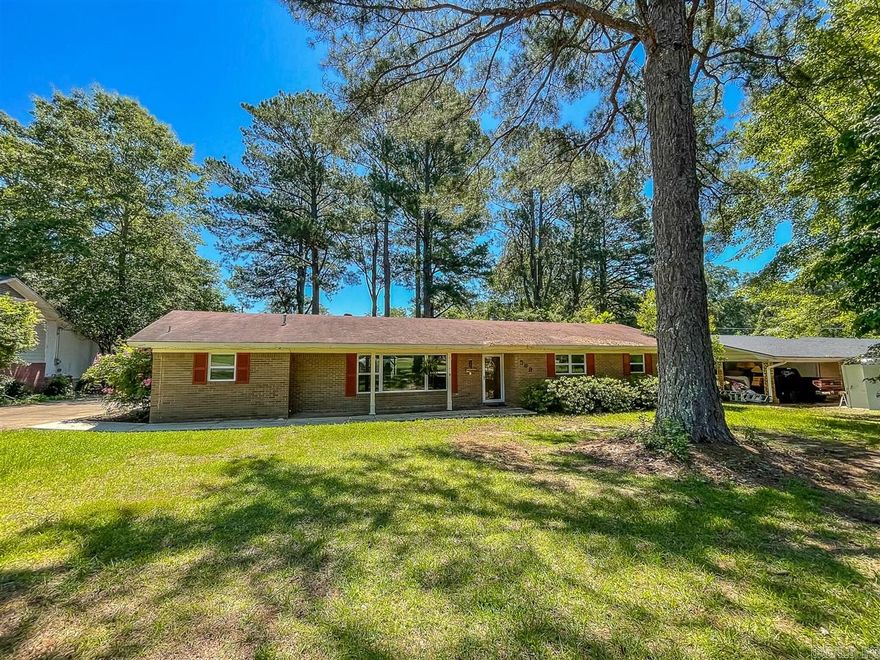 Located in the sought-after Berg Addition, this beautifully updated home is the one you'll fall in love with!    With updated flooring, granite countertops, windows, doors, and tiled walk-in shower, this home has a refreshing appeal from the moment you walk in the door. A bonus room of the kitchen adds versatility and leads to the spacious laundry room. The open concept dining, kitchen and living room provides easy access to the patio and fenced backyard.    Need a little extra room outside? Don't miss the 12x40 shop!    For appointments, call:  Hannah, 870.807.0768  SRG Office, 870.454.4804    *Square footage, tax amounts, year built and lot size procured from courthouse records*