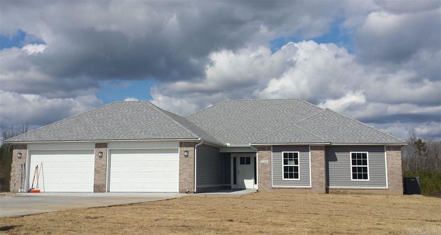 Quality New Construction Home in the Bauxite Area. This 3 BR 2BA home features a very open floor plan, approx 1750 sq ft on approx 1.47 acres. Great Room with Wood Burning Fireplace,Tray Ceiling,  Kitchen-Dining Combo, Stainless Appliances, Cabinetry, Pantry, Granite Counter Tops, Ceramic Tile in all wet areas, Walk-in Closets, 2 car garage over-sized  w/ keypad, covered back porch, in Bauxite School District, AND qualifies for a No Money Down USDA Rural Development Loan.