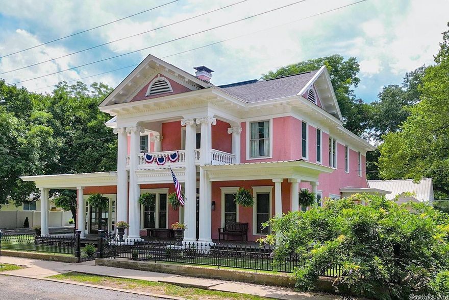 Want to be the next proud owner of this stately historic mansion full of southern charm? Here's your rare opportunity!  The Hensen House features a stunning front porch complimented by large detailed columns. This resilient home survived the 1952 tornado that devastated Judsonia. Recently underwent a major renovation - Current owners intertwined a farmhouse style with modern flair while maintaining it's historic character.  Backyard is built for entertaining! - Balcony, carriage house (could be guest house / MIL suite), outside fireplace, bandstand, & fountain! Totally fenced! Two "bonus" rooms upstairs could be bedrooms! Plenty of space for your growing family!   Would be a great air b&b or bed and breakfast!   Call me for a personal tour today!