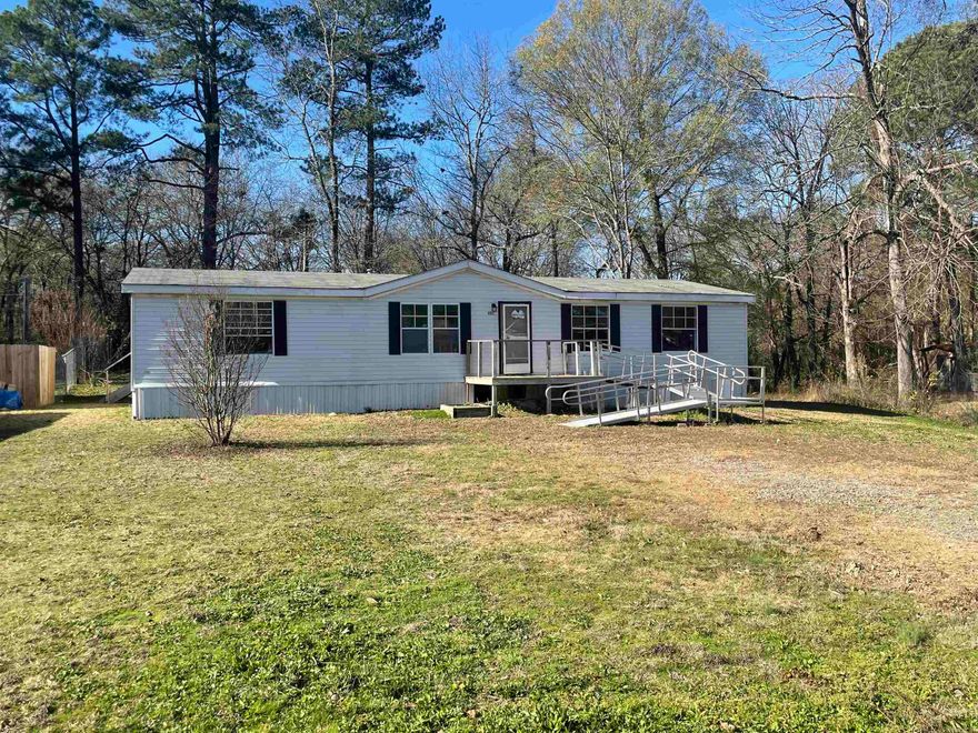 Affordable living in Hot Springs! This 3-bedroom, 2-bath mobile home is located just minutes from downtown, Oaklawn, and the lakes, this home sits in a quiet area and has plenty of potential for the right buyer. Inside, you’ll find a functional layout with a modest kitchen, living area, and three bedrooms. Whether you’re a first time home buyer or an investor, this is a great opportunity.  HUD owned property, sold as-is. Agents see remarks.