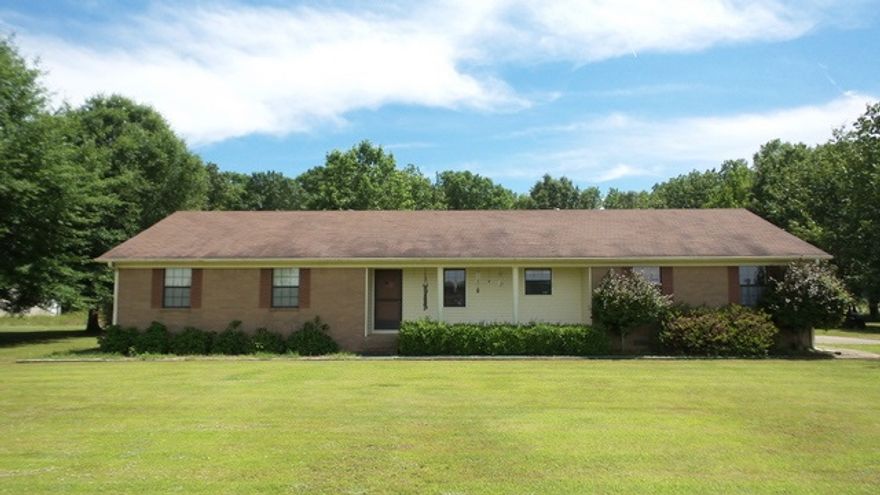 This 3 Br./2 Bath home is approx 1,648 sqft and sits on a great 20 acre tract. The house was built in 1990 and has been very well-kept. A 2-car garage is attached to the house and an additional 2-car detached garage also sits just off the driveway. A large portion of the back yard is fully fenced. There is a nice metal shop building to the East of the house with overhead doors which would makes a great storage or work area. Property will be sold at auction on 7-31-15. Contact Auction Company for more Info.