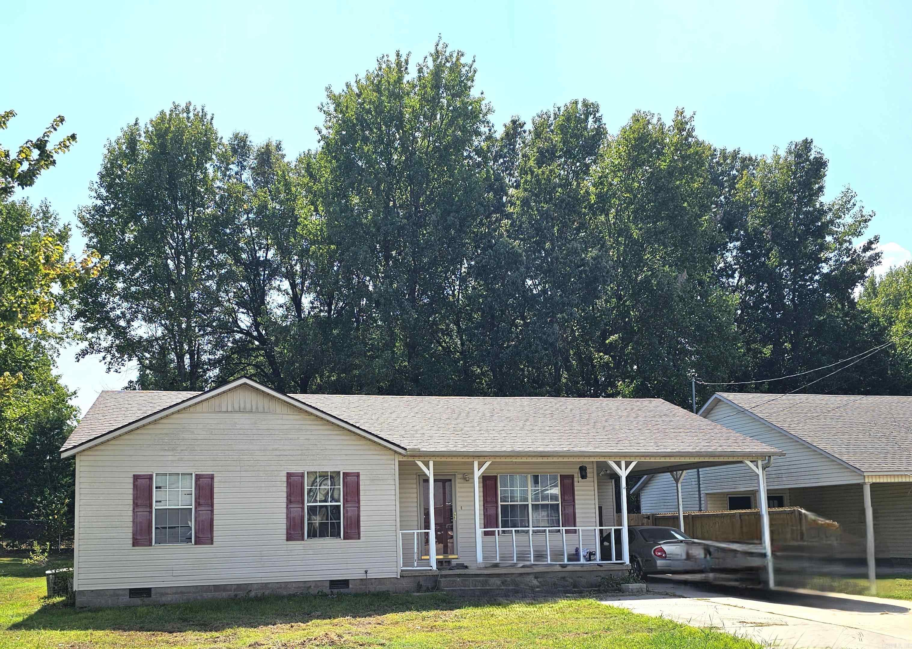 Make this house your home or if you are an investor, add it to your portfolio. Recent improvements include: new roof - August 2025, new bathroom sinks - July 2024, bathrooms floor repair - July 2023, new plank flooring in bathrooms, hall and living room - July 2023 and a new back fence - April 2023. Current tenant has lived there since June of 2019. Not to mislead any buyers, the house does need a little TCL. The railing on the porch needs some attention (very little). The shutters, exteriors doors and the interior of the home could use a fresh coat of paint. Think of it this way, painting a house is like a woman "painting" makeup on their face. A little goes a long ways making us look a whole lot better. :):) Check it out. A house payment on this house could be way less than what you are currently paying in rent.