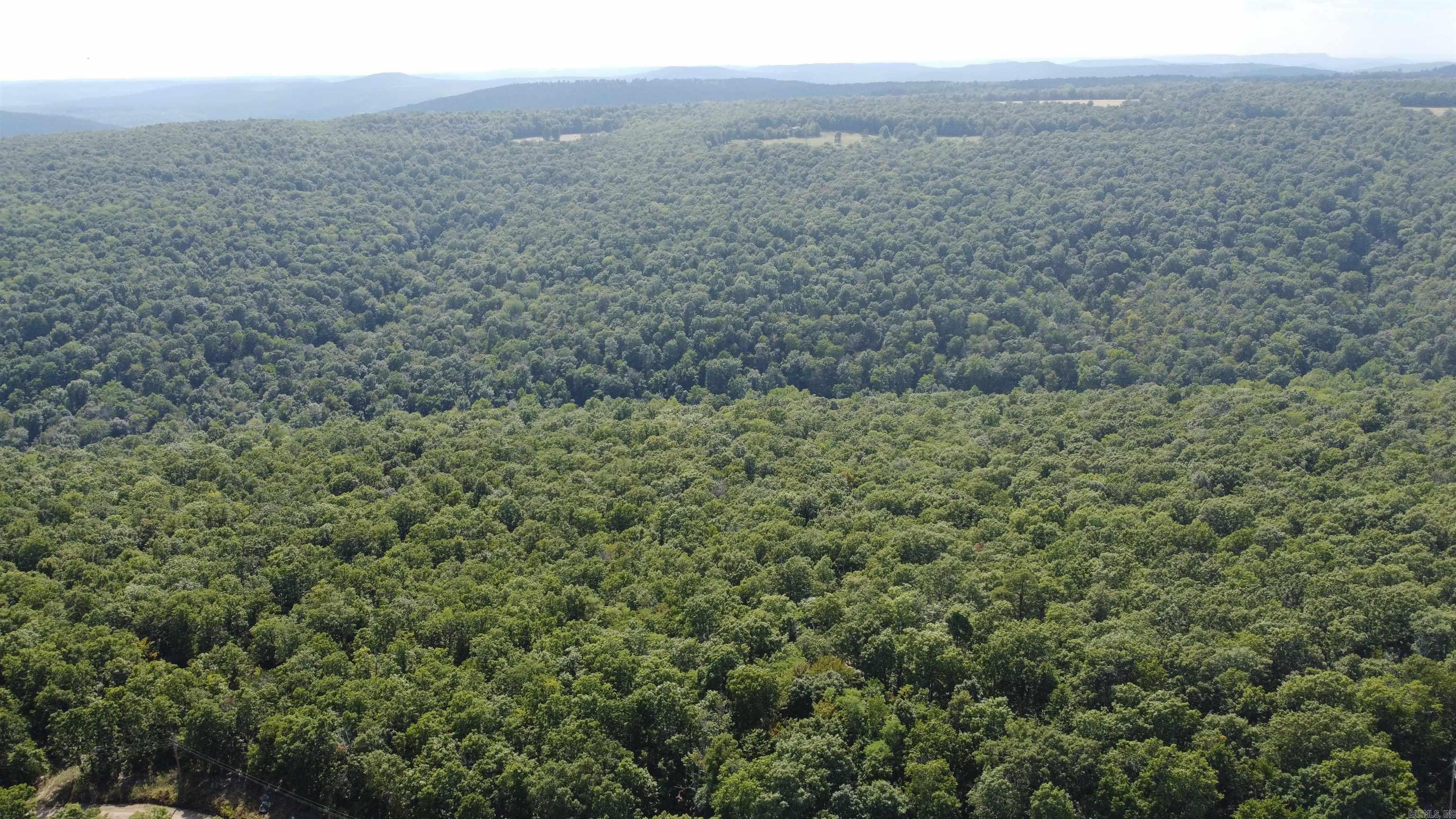 Secluded 10 Acres ā Timberland Recreational & Hunting Land Near Leslie, AR Escape to your own private 10-acre slice of the Ozarks! This secluded, wooded tract is the perfect getaway for hunters, campers, or anyone seeking peace and quiet in nature. Located just 15 minutes from the charming town of Leslie, AR, this property offers a mix of hardwoods, rock outcroppings, gentle terrain, and abundant wildlife, including deer, bear, small game, and turkeyāideal for hunting or hiking. There are no restrictions, giving you the freedom to build a cabin, set up a campsite, park an RV, or create your off-grid retreat. The land is raw, private, and peaceful, with plenty of area for future improvements. Nearby to the Buffalo National River and Greers Ferry Lake, youāll have endless opportunities for kayaking, fishing, boating, and exploring. Whether you're looking for a recreational property, hunting land, or a future homestead, this 10-acre tract offers seclusion surrounded by nature. A great investment in natural beautyācome see it today!