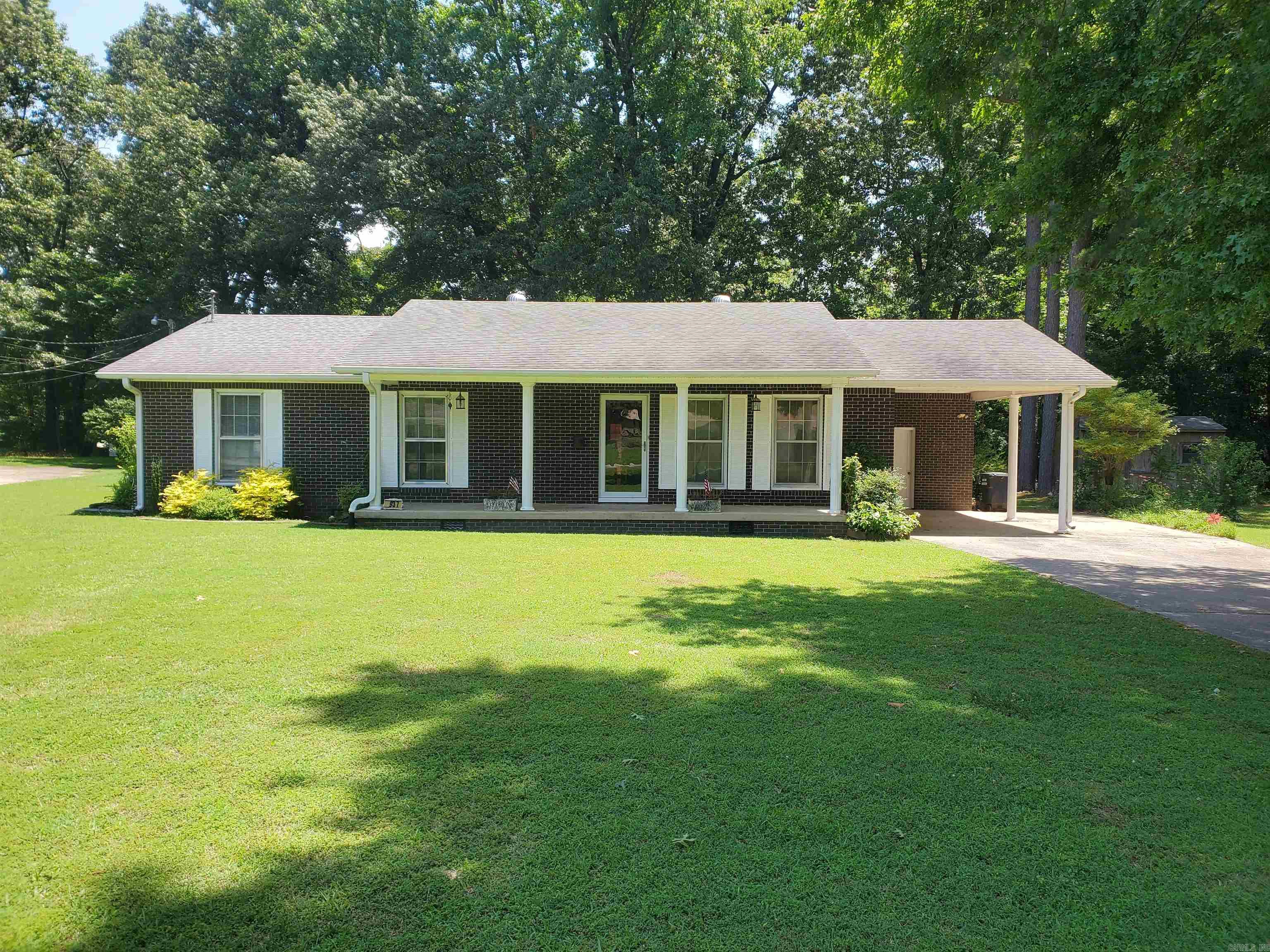 937 Homecrest Drive in Piggott, AR is a 3 BR, 2 BA, 1,742 SF home nestled on a 0.86-acre lot in the beautiful subdivision of Ballard Heights. This one-story residence, built in 1967, features a classic, ranch-style layout blended with vinyl and brick exterior finishes. Featuring a generous yard offering privacy and space for gardening, play, or relaxation. The 3 bedrooms are ideal for families or guests, and the 2 full bathrooms offer convenience and flexibility for households. This home features beautiful hardwood flooring in 2 of the bedrooms, updated bathrooms, a spacious sunroom offering plenty of natural light, and is equipped with a gas log fireplace to create a cozy focal point for family gatherings. The sunroom opens up to a large deck, perfect for outdoor entertaining. This home is close to the golf course and hospital. If you are searching for a move-in ready, spacious home this property checks all the boxes.