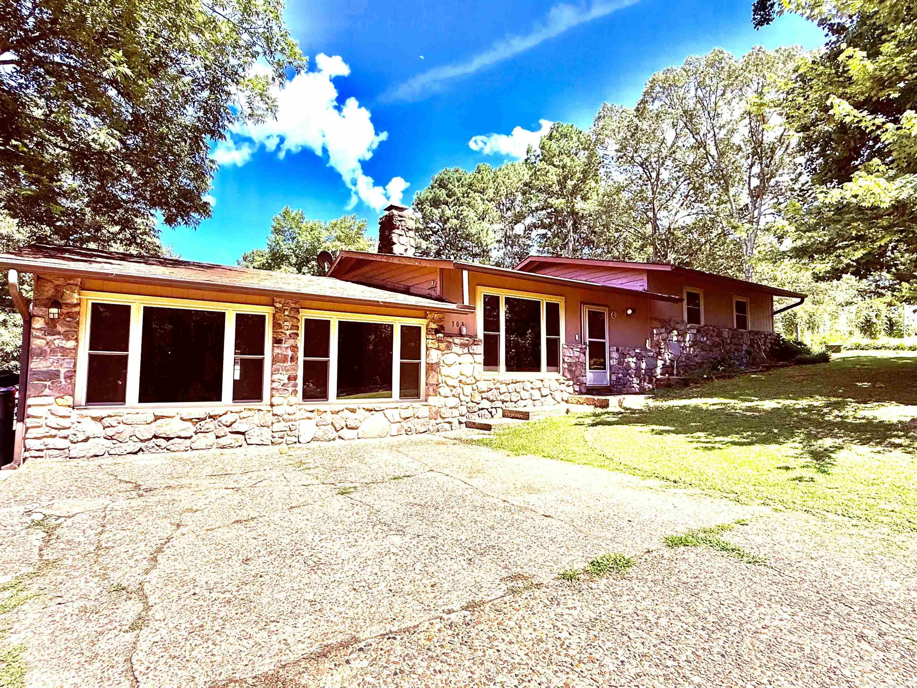 This three bedroom two bath tri-level home sits on a corner lot that is just over an acre and boasts 2 large living spaces as well as an open dining room to the kitchen and living room areas. There is a lovely sunroom off the back & laundry/storage room just off the kitchen. All bedrooms and baths are on the upper level both bathrooms are recently remodeled. All windows have been recently replaced (2023). New electrical panel (2024). There is a large pull through shop out back for your projects and toys as well as a very nice above ground pool with a new pump. This is an all-electric home. All appliances, carports, shed, pool and pool supplies convey.