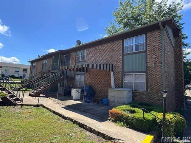 This Upstairs Unit at Villa Marie is Located in the Heart of the City! Walk to Dining, Fitness & Oaklawn Racing. Enjoy Lots of Natural Light from the Many Windows! This Condo is just waiting on a New Owner to Freshen Her Up! The Front Porch overlooks the Green Space. There is also a Nice Awning on the Ground Level near the Back Steps where you can keep your Grill! 2 Covered Parking Spaces. Call Today for More Information.