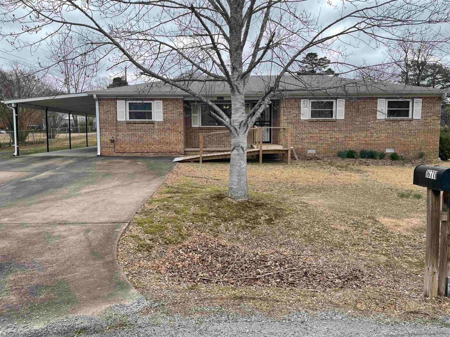 Very well cared for home ** Nice spacious kitchen with lots of cabinets ** Large great room ** laminate throughout ** laundry room ** all brick ** newer windows ** covered patio ** big backyard ** storm shelter ** 14 KW generator with natural gas ** 2 car carport ** parking pads ** 3 Bedroom 2 Bath ** newer heat/air **