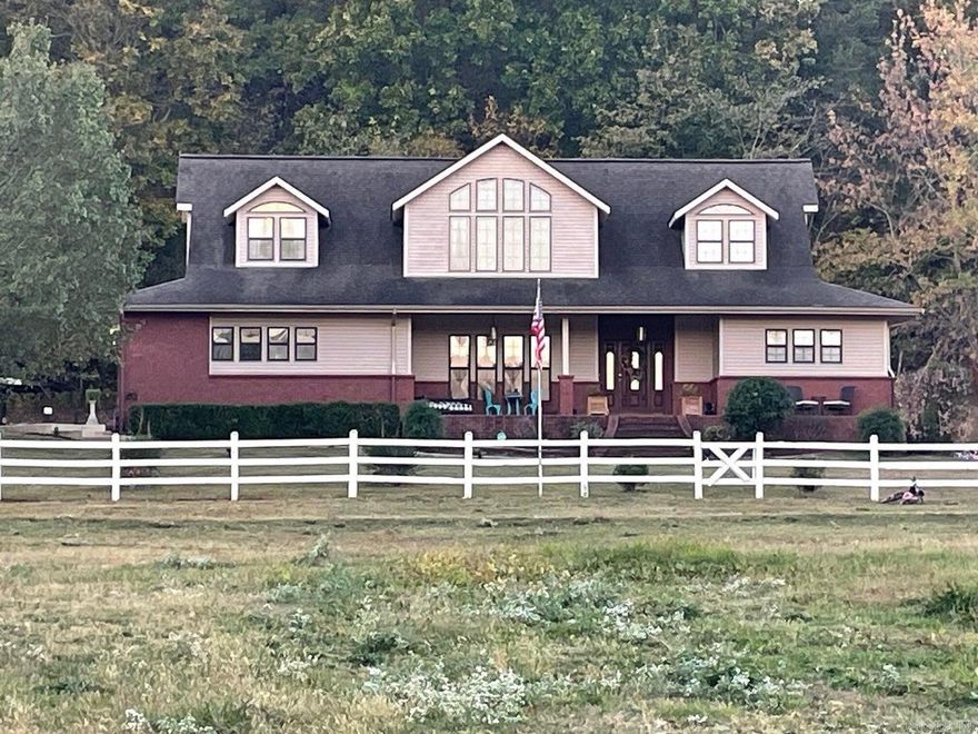 This gorgeous 4 BR 2 full BA, 2 half BA home is topped off w/an additional 1 BR 1 bath en-suite with living-room, kitchenette and add. laundry all included! Home features a large living room w/cathedral ceilings, cozy gas double sided fireplace, quaint dining room overlooking a beautifully manicured, private patio complete w/pool & hot tub. The kitchen comes with an eat in bar and solid oak cabinets for plenty of storage.  Sq.ft. includes finished basement. Property has barn, fenced pasture, pond & several frost-free faucets which makes it perfect for homesteading. There are large trees scattered throughout including pecan and apple. Wooded area perfect for hunting! There are 2 RV hook-ups. Located ¼ mile from White River access and across the road from Greasy Bend Off-Road Park.