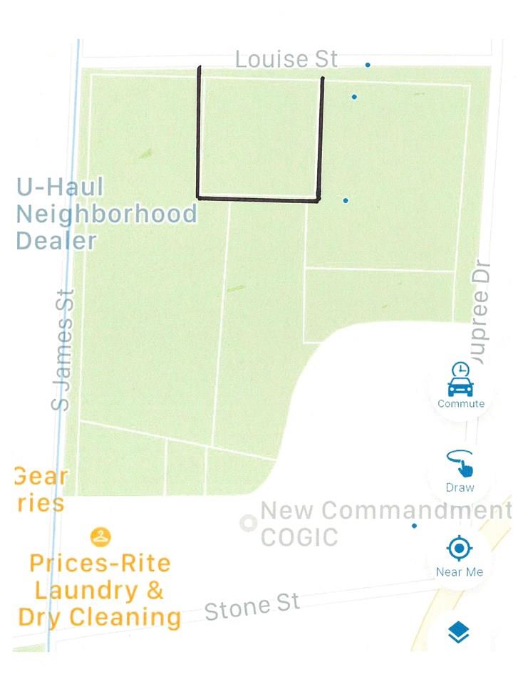 This is a commercial building lot that is just over a half acre. It is in the center of town and on Louise street and there are adjacent properties that could be purchased that could total up to 5 acres +-. THIS PROPERTY IS LOCATED IN AN OPPORTUNITY ZONE.
