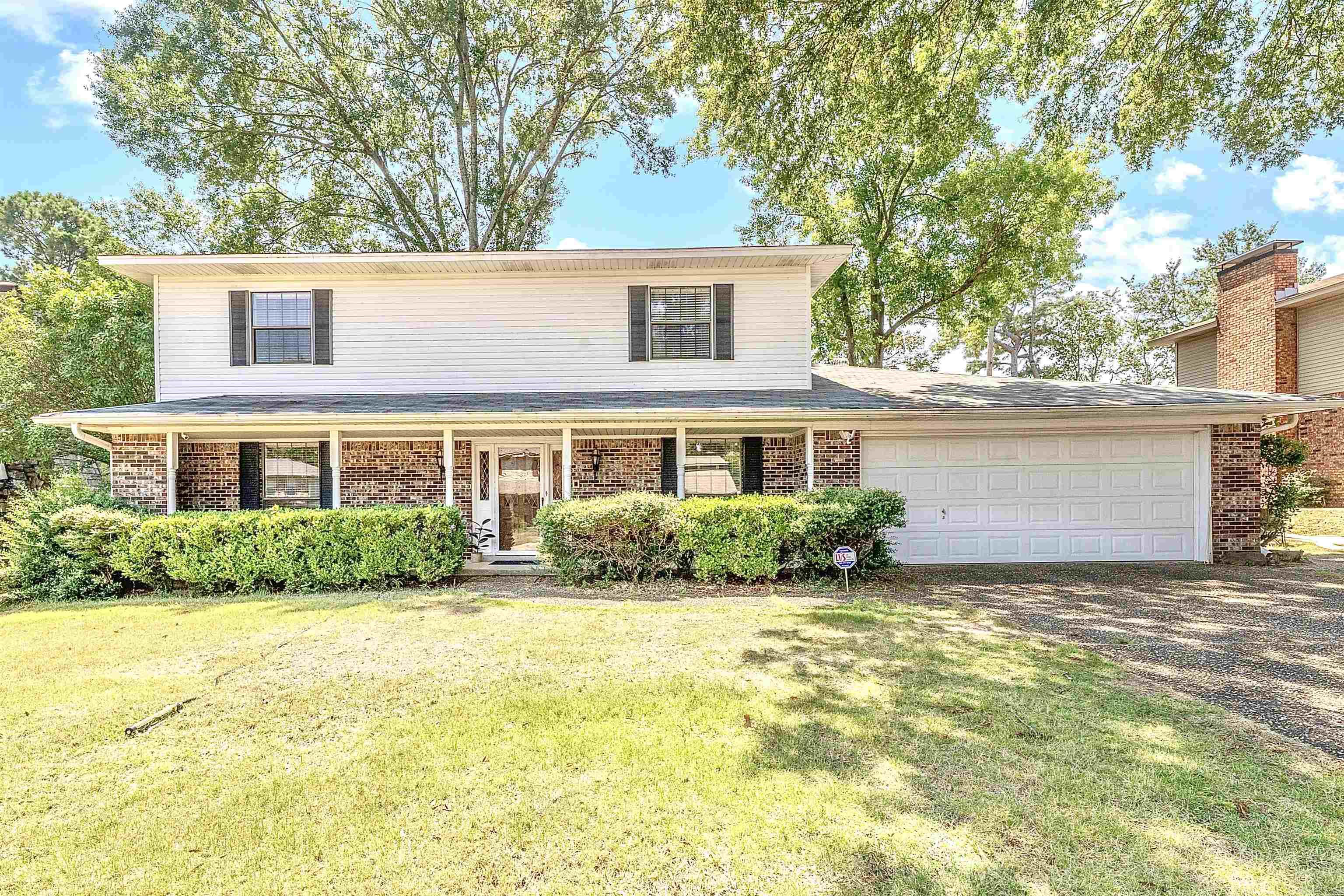 Put your own touch on this perfectly located Lakewood home, just minutes from shopping, dining, schools, hospitals, and highway access. This spacious property features 4 bedrooms, 2.5 baths, and a 2-car garage on a level lot. Step inside to new flooring on the main level, offering two living spaces including an open family room with a gas fireplace and built-ins, plus a formal living and dining room. The remodeled eat-in kitchen shines with granite countertops, abundant cabinetry, stainless steel appliances, and an under-mount sink. Laundry room with extra storage sits conveniently off the kitchen. The large primary suite includes two walk-in closets and a refreshed bath with new tub/shower combo. Three additional bedrooms are on the same level, two with walk-in closets. Relax on the covered back porch with your morning coffee. Storage building included. Schedule your showing today!
