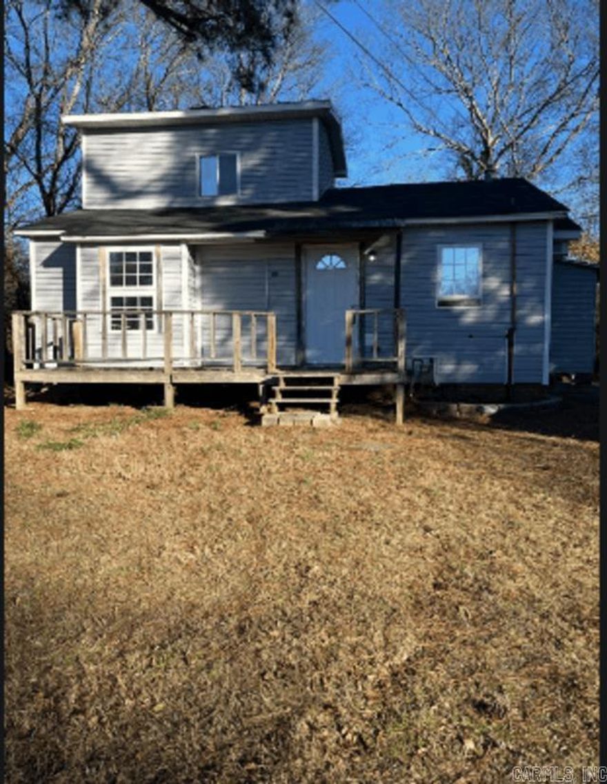 Welcome home to this cozy and well-maintained 2-bedroom, 1-bathroom single-family residence in Malvern. Featuring nearly 1,000 sq ft of living space, this home offers a perfect blend of comfort and functionality. Enjoy the fresh feel of recent updates, including durable laminate flooring throughout.  There’s also a spacious upstairs bonus room—ideal for a quiet home office or TV room. The kitchen comes equipped with a free-standing range and plenty of cabinet space, leading into a dedicated laundry area with washer/dryer hookups. Located in a quiet neighborhood within city limits, you are just minutes away from local schools and downtown Malvern.