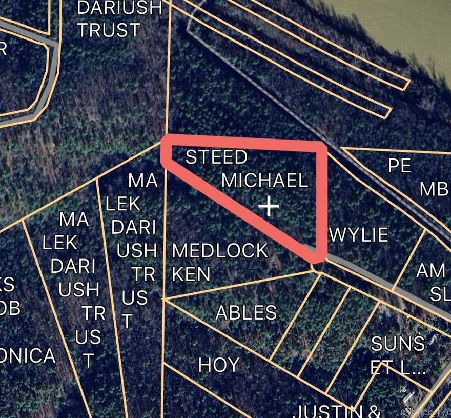 4.27 acres of wooded land ready for new owners! Being located at the end of the road, it has a private and secluded feel.