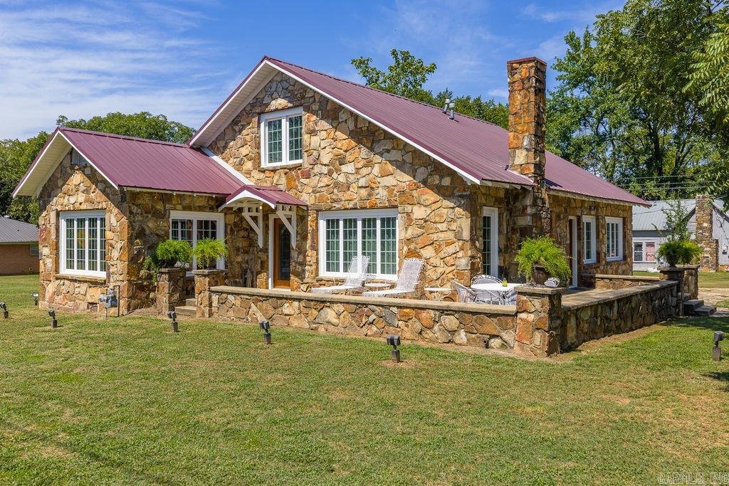 Beautifully preserved historic home on spacious corner lot. Seller has taken great care to restore and preserve this homes beautiful history while updating all the necessary things like plumbing and electrical, home has new windows and doors and updated HVAC. Everything done with the highest quality materials and craftsmanship. This is a true gem for the "old house" lovers or just for a large or growing family. 3 bdrms downstairs and 2 upstairs, home features a living room and parlor. Spacious modern kitchen with plenty of storage and pantry space, dining room is big enough for all your family gatherings. Home was recently appraised. Metal roof.