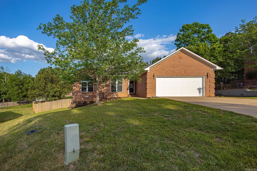 This Maumelle house offers 9 foot ceilings on a large 0.31 acre lot. The expansive backyard is a true highlight, featuring a 12x24 deck topped with a 10x13 gazebo. Large primary suite offers a jacuzzi style tub and a 50 gallon Hot water heater. Valuable upgrades for peace of mind include: Architectural Shingle roof March 2021 Fence with two on-site welded gates March 2023 Attic insulation March 2026 Tucked away on the end of a low traffic double cul-de-sac, makes this home offer a rare combination of privacy and location.