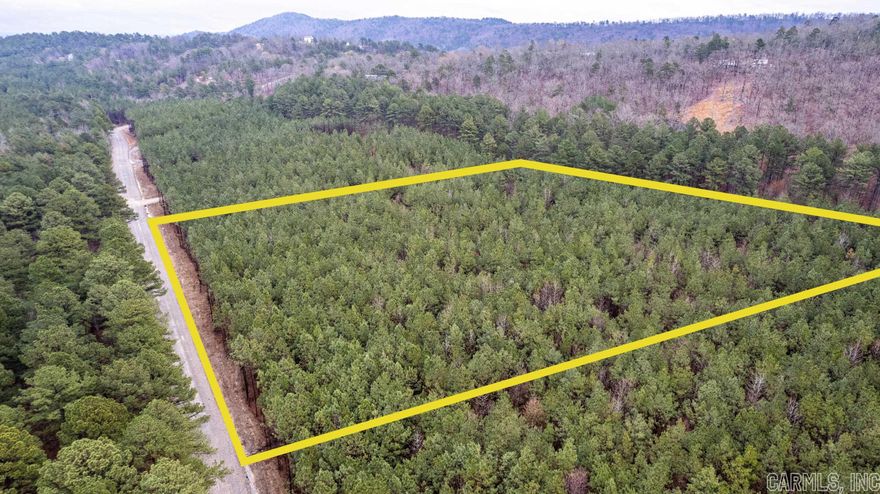 Rare find in Fountain Lake! This upcoming subdivision is very private, peaceful and secluded. This 7+/- acre parcel is nestled in the woods and perfect for building your dream home or hunting cabin. Just 10 minutes to Hot Springs and 20 mins to HSV. Min 1,400sq ft building requirement. No HOA fee. Mobile Homes not allowed. Neighboring lot also available for purchase.